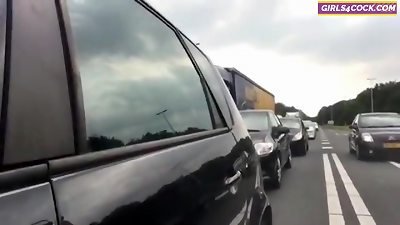 steamy blonde is spunking in the Car when People drive by