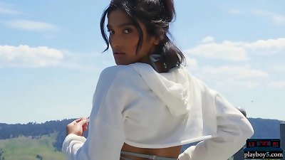 Indian mommy model stripteasing outdoor and plays with a hose